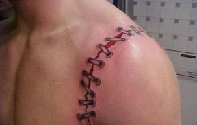looks like this guy has stitches but it is just a tatoo